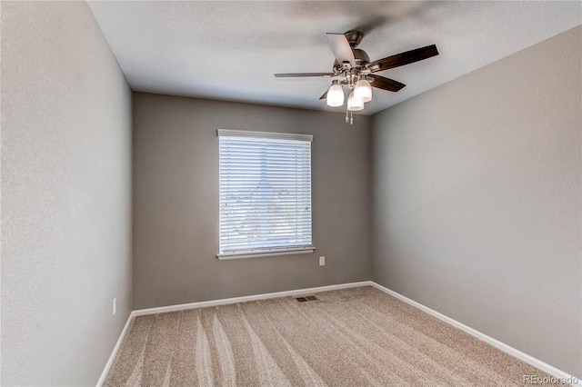 25046 E Bayaud Pl, Aurora, CO 80018 - carpeted empty room featuring a ceiling fan and baseboards