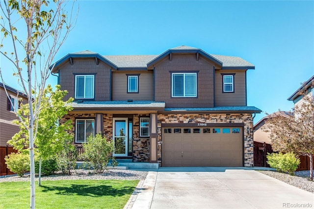 25046 E Bayaud Pl, Aurora, CO 80018 - craftsman house with an attached garage and concrete driveway