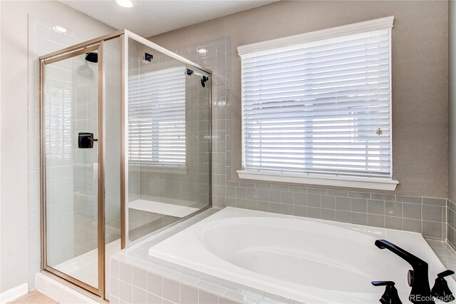 25046 E Bayaud Pl, Aurora, CO 80018 - full bathroom with a bath, a stall shower, and recessed lighting