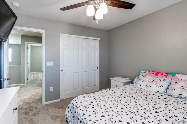 25046 E Bayaud Pl, Aurora, CO 80018 - bedroom with light carpet, a closet, and ceiling fan