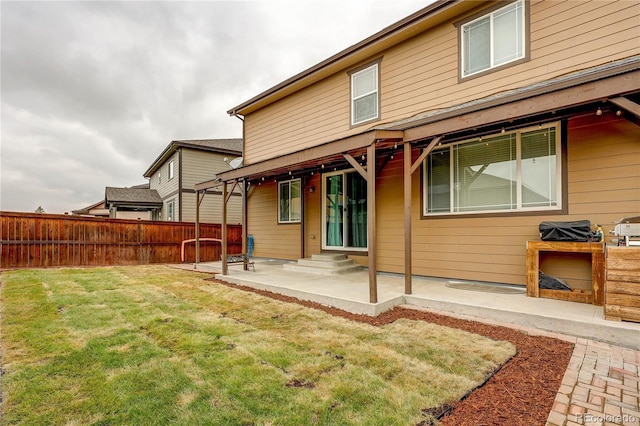 25046 E Bayaud Pl, Aurora, CO 80018 - back of house featuring a patio area