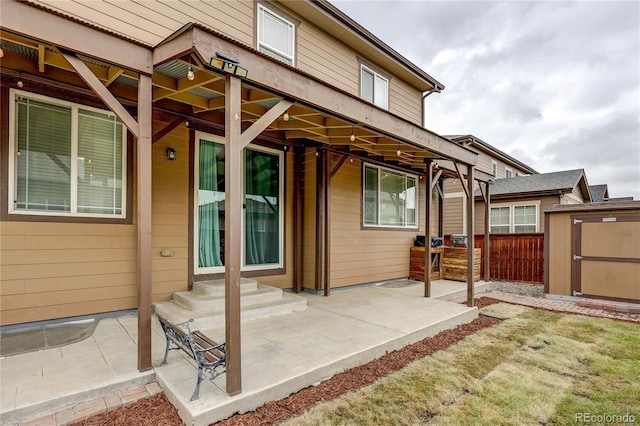25046 E Bayaud Pl, Aurora, CO 80018 - view of exterior entry featuring a patio area