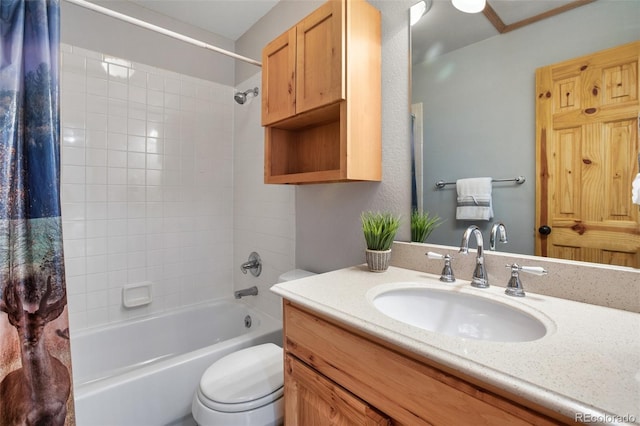 full bathroom with vanity, toilet, and shower / bath combo