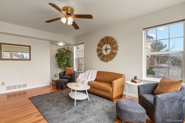 3244 Capstan Way, Colorado Springs, CO 80906 - living room featuring ceiling fan and hardwood / wood-style floors