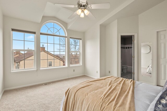 3244 Capstan Way, Colorado Springs, CO 80906 - carpeted bedroom featuring ceiling fan, lofted ceiling, and connected bathroom