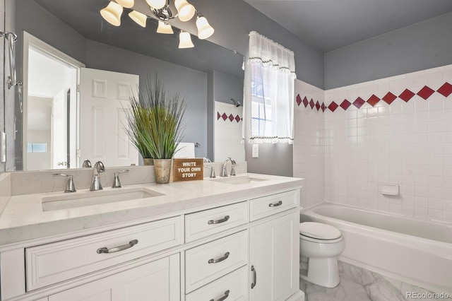 3244 Capstan Way, Colorado Springs, CO 80906 - full bathroom featuring tiled shower / bath, vanity, toilet, and a notable chandelier