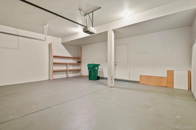 3244 Capstan Way, Colorado Springs, CO 80906 - garage featuring a garage door opener