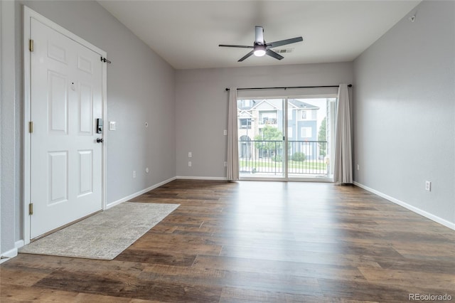4451 S Ammons St Unit 2-204, Littleton, CO 80123 - spare room featuring ceiling fan and dark wood finished floors