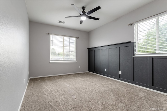 4451 S Ammons St Unit 2-204, Littleton, CO 80123 - unfurnished room featuring carpet floors and ceiling fan