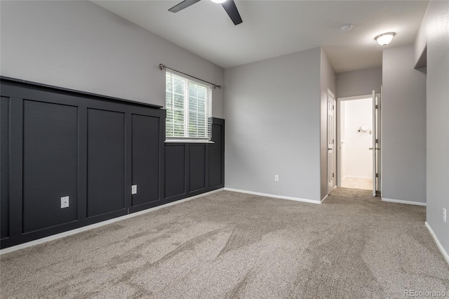 4451 S Ammons St Unit 2-204, Littleton, CO 80123 - unfurnished bedroom with carpet floors and a ceiling fan