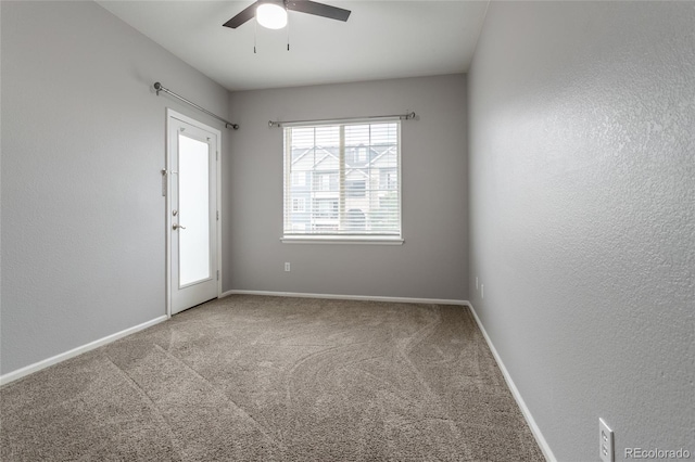 4451 S Ammons St Unit 2-204, Littleton, CO 80123 - unfurnished room with ceiling fan and carpet flooring