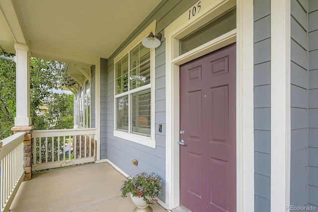 9381 Ashbury Cir Unit 105, Parker, CO 80134 - view of exterior entry with covered porch