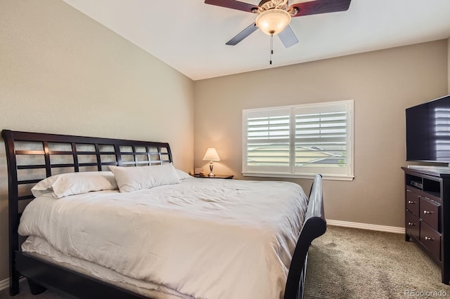 9381 Ashbury Cir Unit 105, Parker, CO 80134 - bedroom with carpet and a ceiling fan