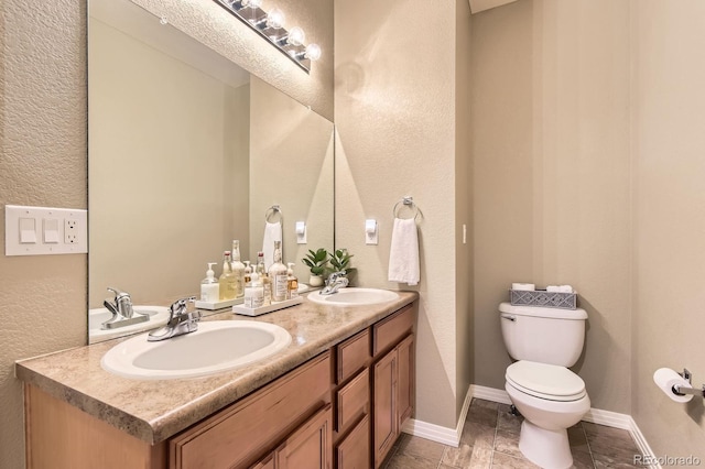 9381 Ashbury Cir Unit 105, Parker, CO 80134 - full bath featuring double vanity and a textured wall