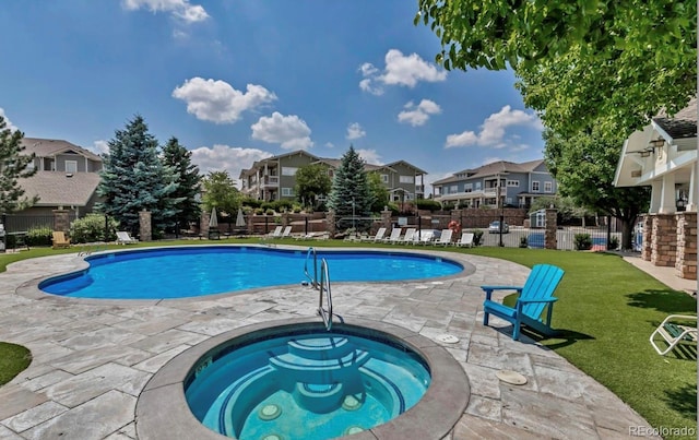 9381 Ashbury Cir Unit 105, Parker, CO 80134 - community pool with a residential view, a hot tub, and a patio