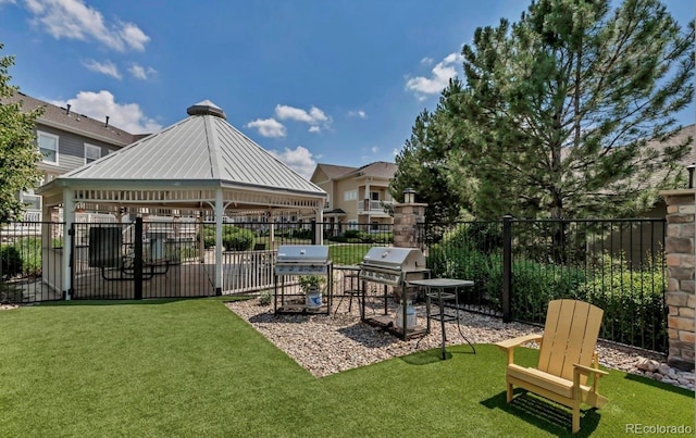 9381 Ashbury Cir Unit 105, Parker, CO 80134 - view of yard with a gazebo