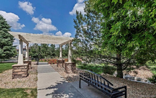 9381 Ashbury Cir Unit 105, Parker, CO 80134 - view of property's community featuring a pergola and a patio area