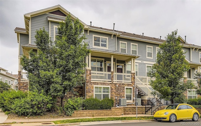 9381 Ashbury Cir Unit 105, Parker, CO 80134 - view of building exterior with stairway