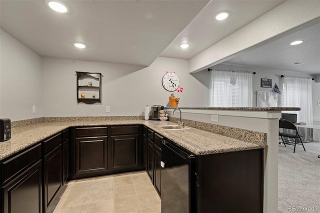 2200 Cadman St, Berthoud, CO 80513 - kitchen featuring a sink, black dishwasher, a peninsula, recessed lighting, and light stone countertops
