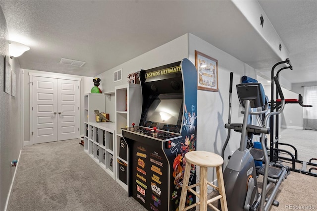 2200 Cadman St, Berthoud, CO 80513 - game room with a textured ceiling, carpet floors, and baseboards