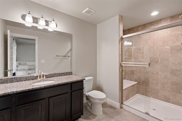 2200 Cadman St, Berthoud, CO 80513 - full bath featuring a shower stall, toilet, vanity, tile patterned flooring, and baseboards