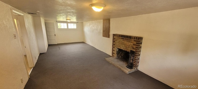 9120 Elm Ct, Denver, CO 80260 - basement featuring a fireplace, electric panel, a textured ceiling, and carpet floors