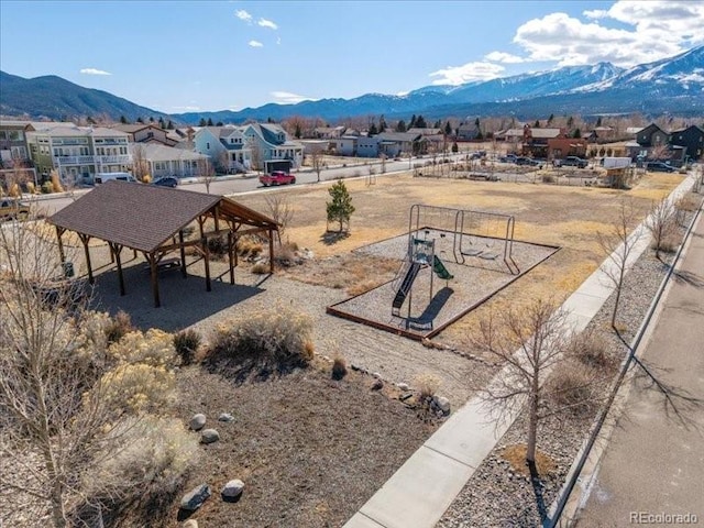 view of property's community featuring a residential view and a mountain view