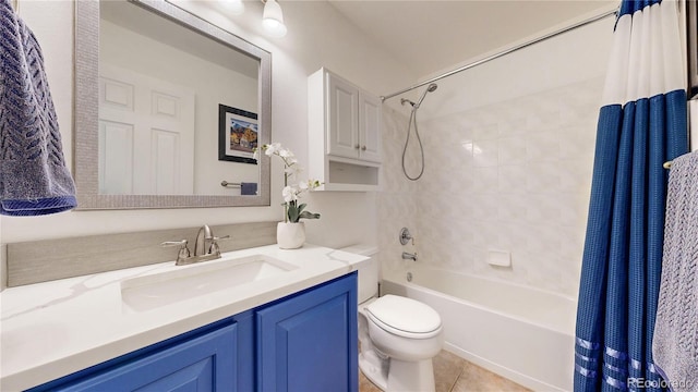 bathroom with shower / tub combo with curtain, toilet, vanity, and tile patterned floors