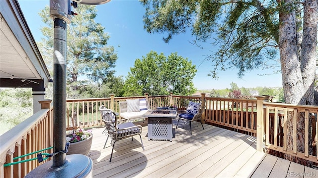 deck featuring a fire pit