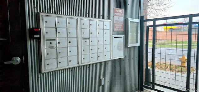 view of home's community featuring mail boxes