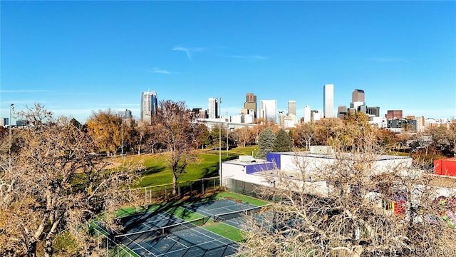 exterior space featuring tennis court