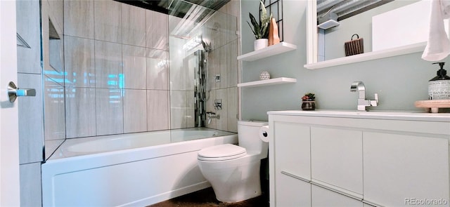 full bathroom featuring vanity, toilet, and tiled shower / bath