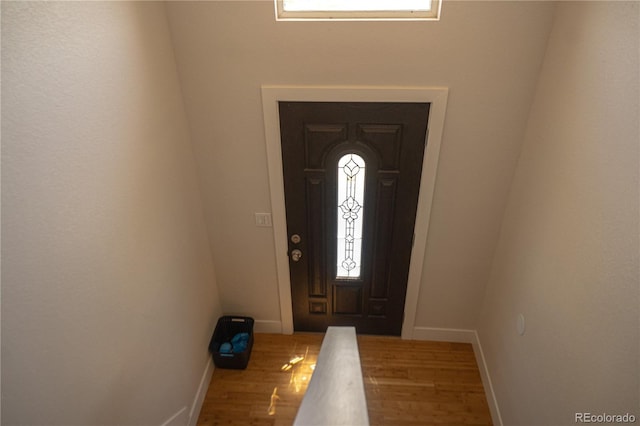 38810 Jacobson Rd, Rush, CO 80833 - foyer with wood finished floors and baseboards