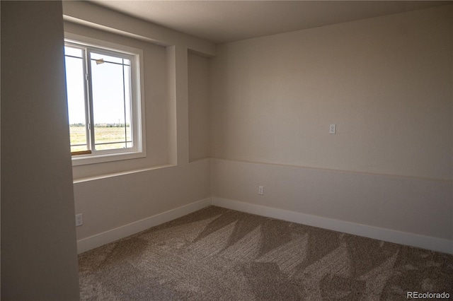 38810 Jacobson Rd, Rush, CO 80833 - carpeted empty room featuring baseboards