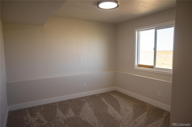 38810 Jacobson Rd, Rush, CO 80833 - empty room featuring carpet flooring and baseboards