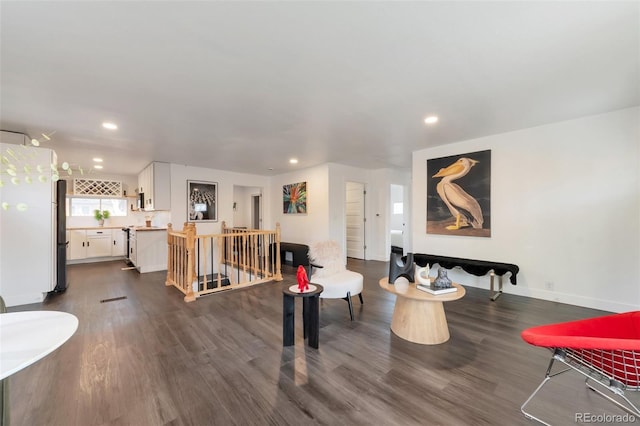 interior space with dark hardwood / wood-style flooring