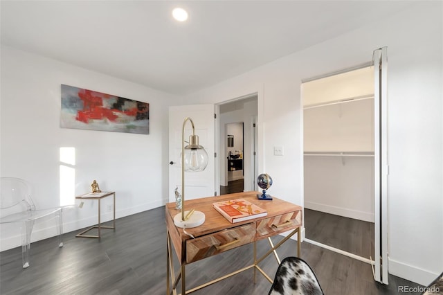 office space with dark hardwood / wood-style flooring