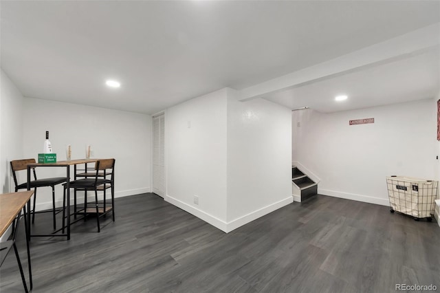 dining area featuring dark wood-type flooring