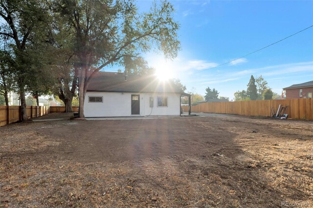 back of house with a patio area