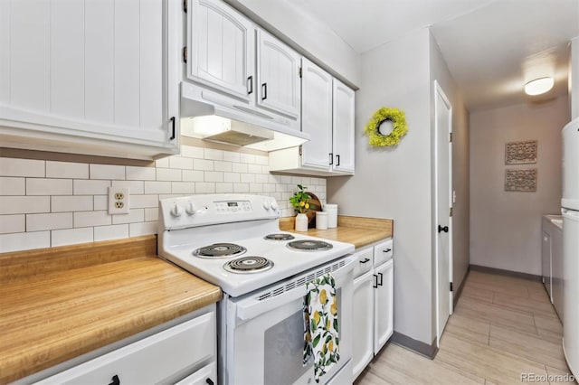 kitchen featuring tasteful backsplash, under cabinet range hood, light countertops, electric range, and white cabinets