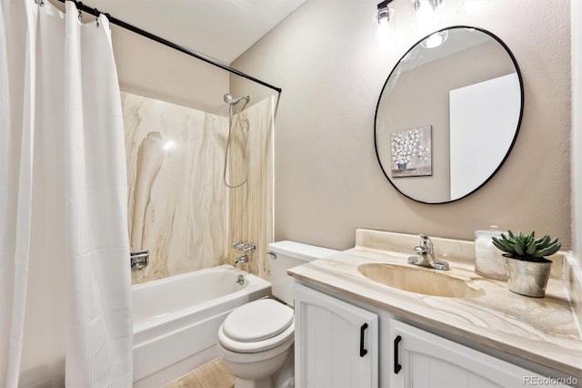 bathroom with toilet, vanity, and shower / bath combo