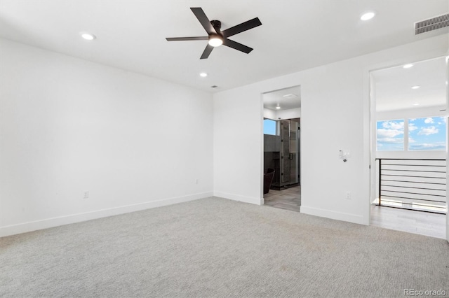 995 Pinehurst Ct, Bennett, CO 80102 - empty room featuring light carpet, ceiling fan, and recessed lighting