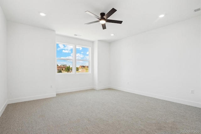995 Pinehurst Ct, Bennett, CO 80102 - unfurnished room featuring a ceiling fan, light carpet, and recessed lighting