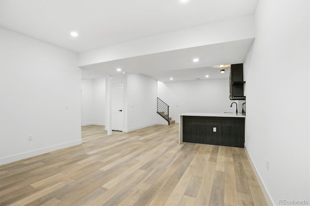 995 Pinehurst Ct, Bennett, CO 80102 - bar with stairs, light wood-style floors, and recessed lighting