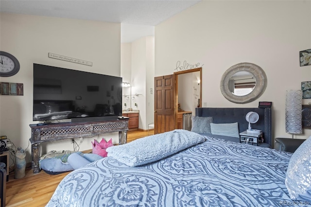 15149 E Princeton Pl Unit B, Aurora, CO 80014 - bedroom with light wood-style floors and connected bathroom