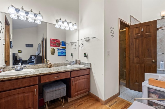15149 E Princeton Pl Unit B, Aurora, CO 80014 - bathroom featuring a shower stall and double vanity
