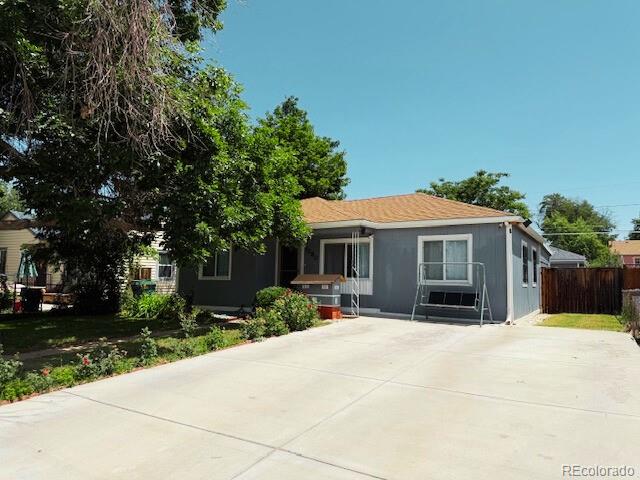 1280 Alton St, Aurora, CO 80010 - view of front of house featuring driveway