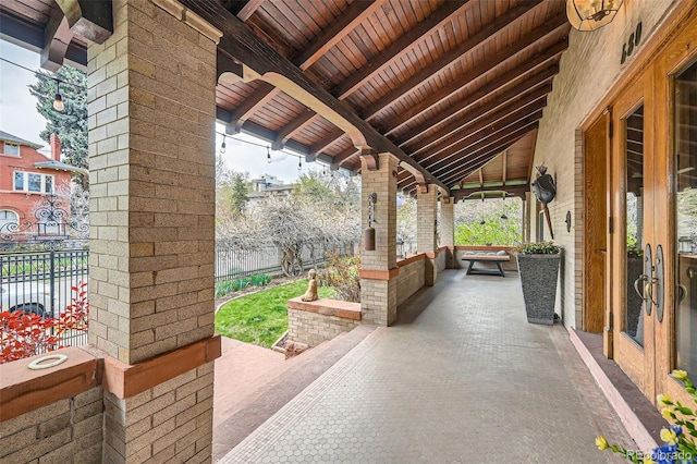 view of patio featuring fence