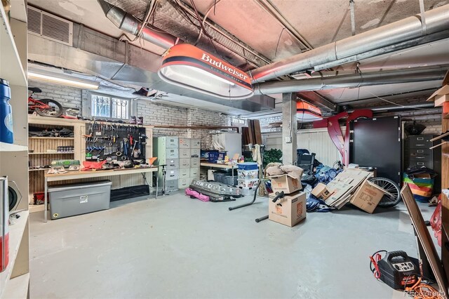 below grade area featuring a workshop area and visible vents