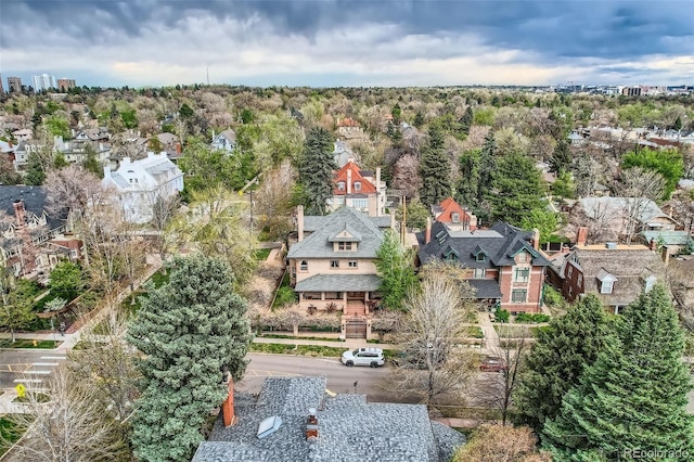 birds eye view of property with a residential view